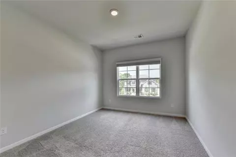 Bedroom - 3828 Amicus Dr, Buford, GA 30519 photo 9 of 10