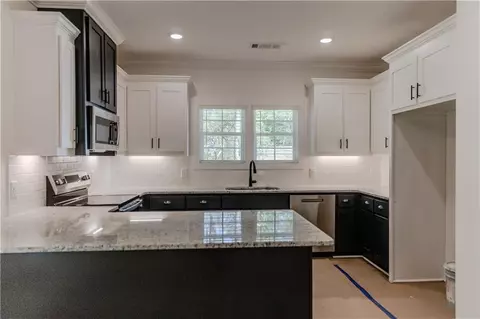 Kitchen - 632 Campbell Rd, Covington, GA 30014 photo 2 of 2