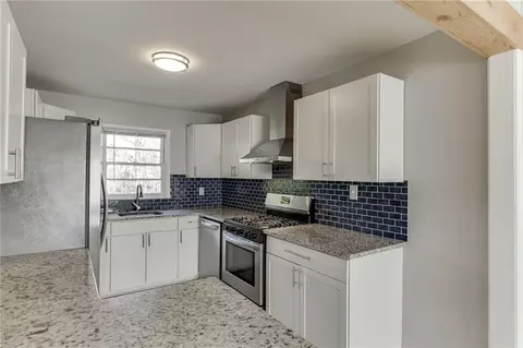 Kitchen - 300 Forest St, Buford, GA 30518 photo 3 of 3
