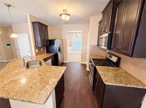 Kitchen - 2471 Quincy Loop, Fairburn, GA 30213 photo 2 of 2