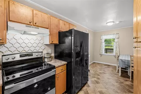 Kitchen - 163 Ben Putnam Rd, Resaca, GA 30735 photo 2 of 3