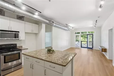 Living - 5300 Peachtree Rd #1204, Atlanta, GA 30341 photo 1 of 5