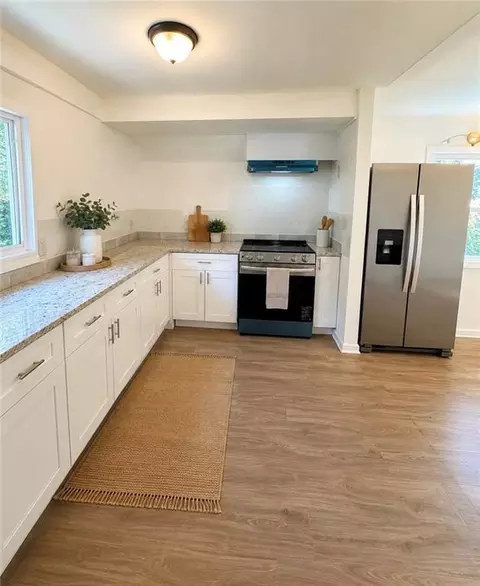 Kitchen - 8137 SW Nelson Dr SW, Covington, GA 30014 photo 2 of 3