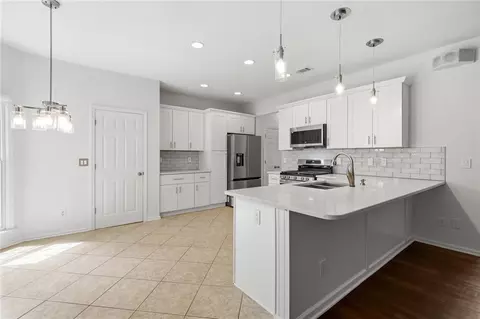 Kitchen - 2150 Pendleton Pl, Suwanee, GA 30024 photo 3 of 5