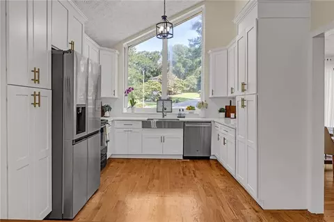 Kitchen - 594 Farmbrook Trl NE, Kennesaw, GA 30144 photo 1 of 2