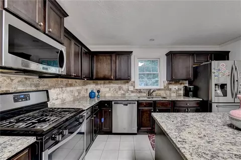 Kitchen - 117 Ridge Rd, Berkeley Lake, GA 30096 photo 2 of 4