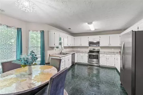 Kitchen - 245 Cypress Dr, Covington, GA 30016 photo 2 of 4