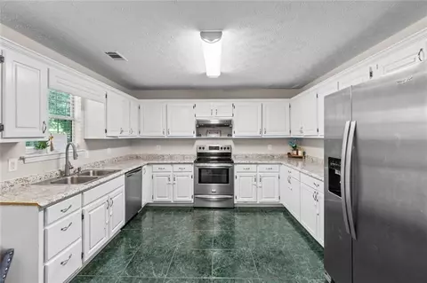 Kitchen - 245 Cypress Dr, Covington, GA 30016 photo 4 of 4