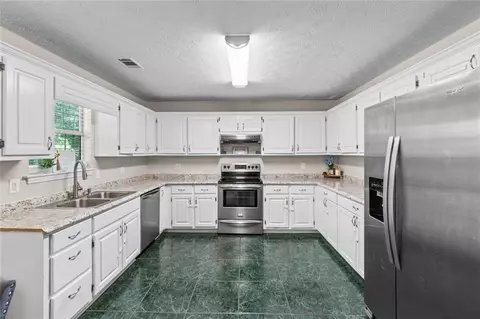 Kitchen - 245 Cypress Dr, Covington, GA 30016 photo 4 of 4