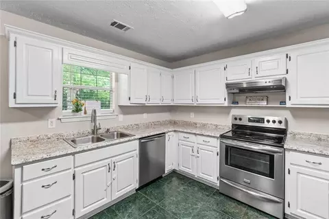 Kitchen - 245 Cypress Dr, Covington, GA 30016 photo 3 of 4