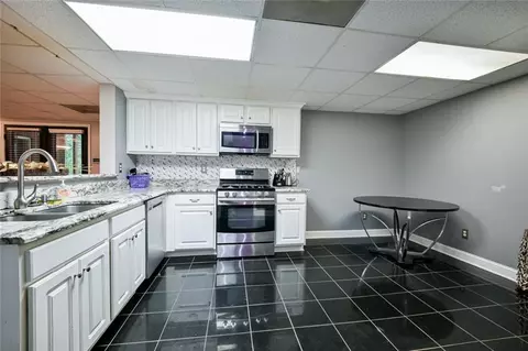 Kitchen - 12426 Edgewater Dr, Hampton, GA 30228 photo 3 of 3