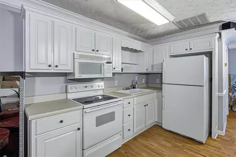 Kitchen - 235 Roberts Rd, Covington, GA 30016 photo 5 of 5