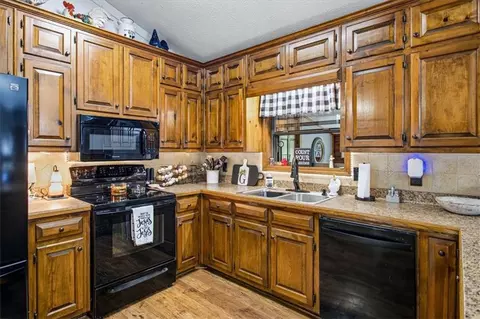 Kitchen - 235 Roberts Rd, Covington, GA 30016 photo 2 of 5