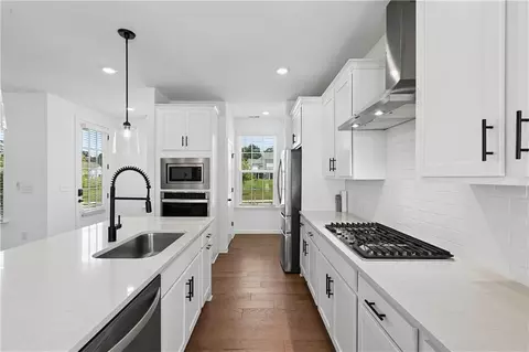Kitchen - 4448 Encore Park Xing, Duluth, GA 30097 photo 2 of 3