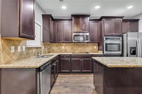 Kitchen - 121 Escalade Dr, Mcdonough, GA 30253 photo 2 of 2