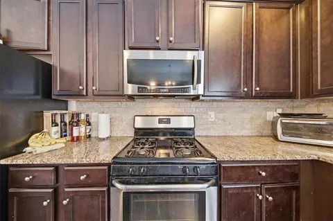 Kitchen - 1126 Paramount Dr, Mcdonough, GA 30253 photo 3 of 4