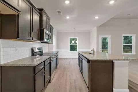 Kitchen - 216 Rhett Dr, Bowdon, GA 30108 photo 2 of 3