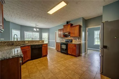 Kitchen - 249 Hedgewood Dr, Hampton, GA 30228 photo 7 of 7