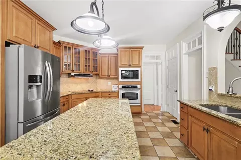 Kitchen - 313 Fallstone Path, Mcdonough, GA 30253 photo 3 of 3
