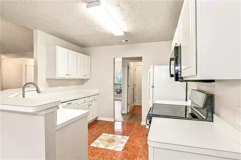 Kitchen - 1426 Hyde Ct, Hampton, GA 30228 photo 2 of 2