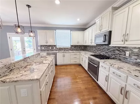 Kitchen - 1639 Mapmaker Dr, Dacula, GA 30019 photo 3 of 3