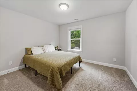 Bedroom - 656 E Lake Rd, Mcdonough, GA 30252 photo 8 of 13