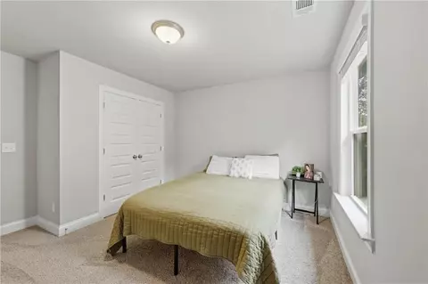 Bedroom - 656 E Lake Rd, Mcdonough, GA 30252 photo 9 of 13