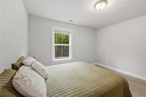 Bedroom - 656 E Lake Rd, Mcdonough, GA 30252 photo 10 of 13