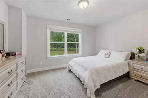 Bedroom - 656 E Lake Rd, Mcdonough, GA 30252 photo 11 of 13