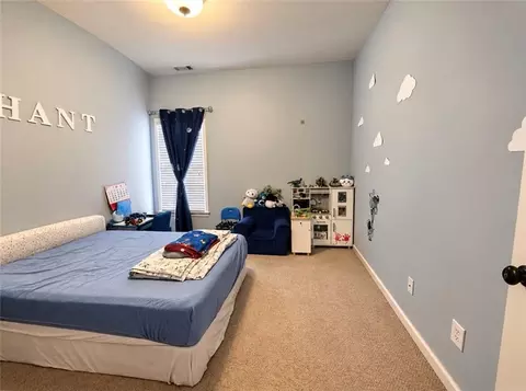 Bedroom - 1653 Elesmere Oak Ct, Duluth, GA 30097 photo 4 of 11
