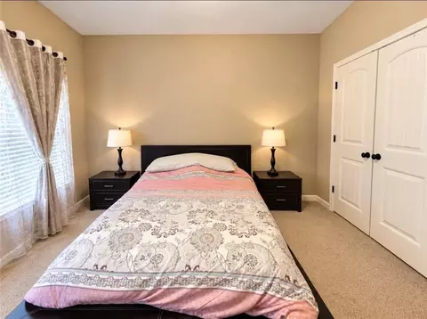 Bedroom - 1653 Elesmere Oak Ct, Duluth, GA 30097 photo 7 of 11