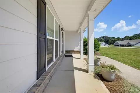 Exterior - 62 Windrow Trl, Statham, GA 30666 photo 4 of 9