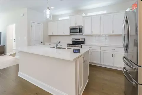 Kitchen - 4230 Easter Lily Ave, Buford, GA 30519 photo 2 of 4