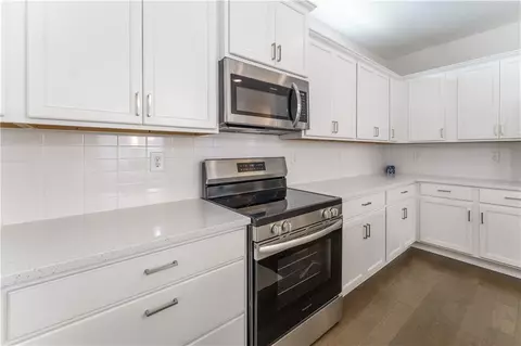 Kitchen - 4230 Easter Lily Ave, Buford, GA 30519 photo 3 of 4