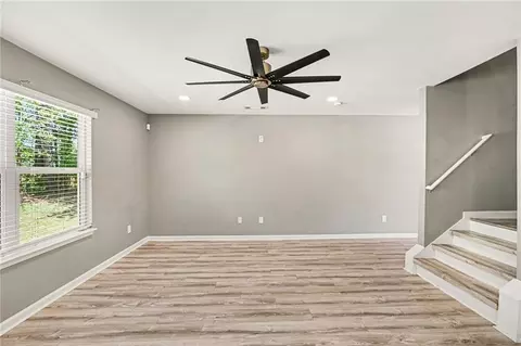Living - 1128 Oak Hollow Ln, Hampton, GA 30228 photo 3 of 4