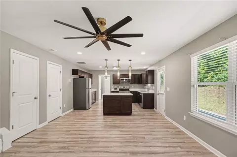 Living - 1128 Oak Hollow Ln, Hampton, GA 30228 photo 1 of 4