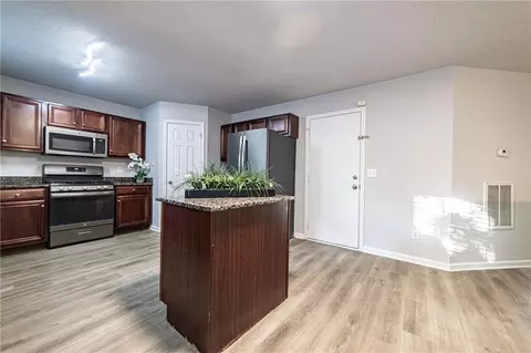 Kitchen - 596 Vaughan Dr, Hampton, GA 30228 photo 6 of 6