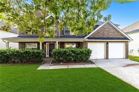 Exterior - 596 Vaughan Dr, Hampton, GA 30228 photo 2 of 10