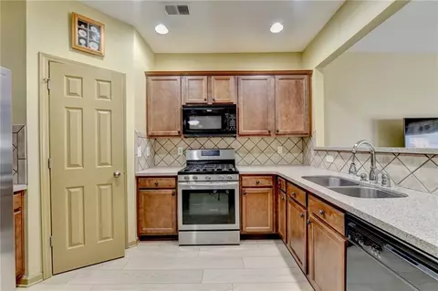Kitchen - 2726 Beynon Ln, Suwanee, GA 30024 photo 2 of 3