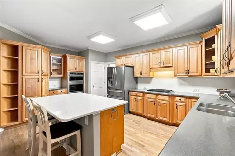 Kitchen - 238 Rivergate Dr, Suwanee, GA 30024 photo 2 of 4