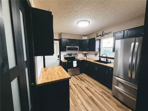 Kitchen - 320 Langston Rd, Perry, GA 31069 photo 1 of 2