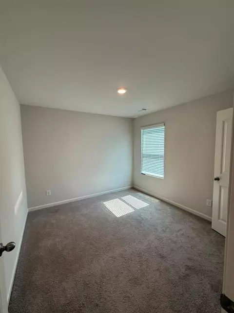 Bedroom - 7481 Hawk Tail Way, Fairburn, GA 30213 photo 4 of 5
