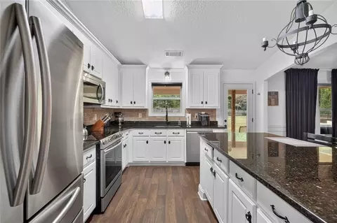 Kitchen - 1433 Palmer Dr, Monroe, GA 30656 photo 5 of 6