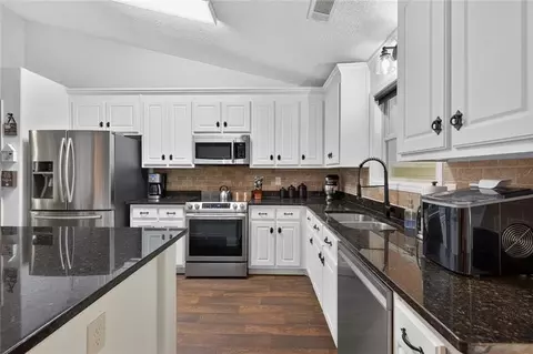 Kitchen - 1433 Palmer Dr, Monroe, GA 30656 photo 3 of 6