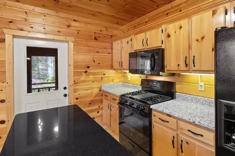 Kitchen - 105 River Rd, Cherry Log, GA 30522 photo 2 of 3