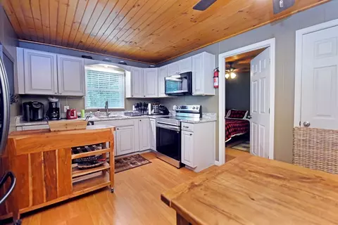 Kitchen - 13111 Big Creek Rd, Cherry Log, GA 30522 photo 2 of 3