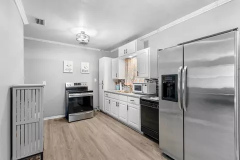 Kitchen - 306 W Cedar St, Perry, FL 32348 photo 1 of 2