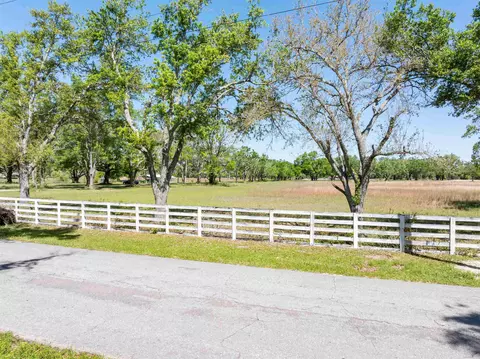 Exterior - 444 SE Bisbee Loop, Lee, FL 32059 photo 2 of 13