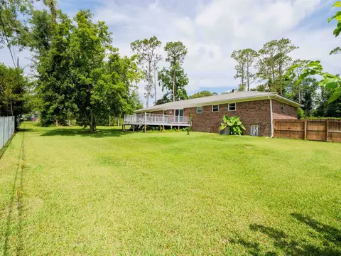 Exterior - 405 NW Whispering Pines Loop, Madison, FL 32340 photo 5 of 15