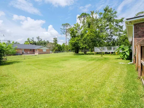 Exterior - 405 NW Whispering Pines Loop, Madison, FL 32340 photo 6 of 15